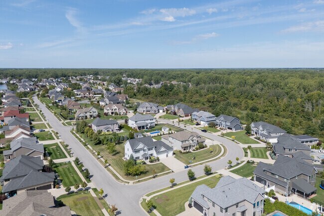 Homes in North Amherst have outdoors pools and wide suburban streets.