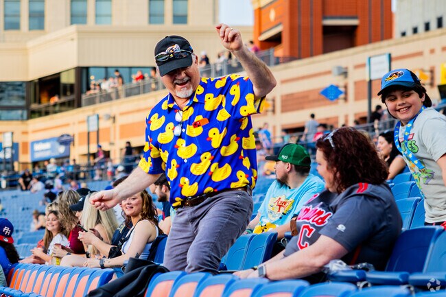 In excitement, fans cheer on the Rubber Ducks in Downtown Akron.