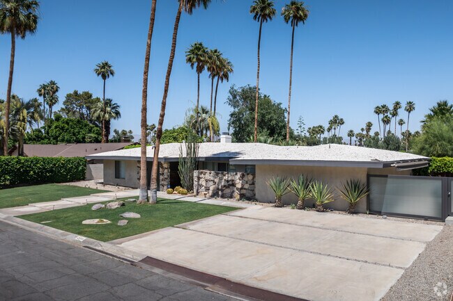 A single-story ranch home in Indian Canyons features a spacious driveway.