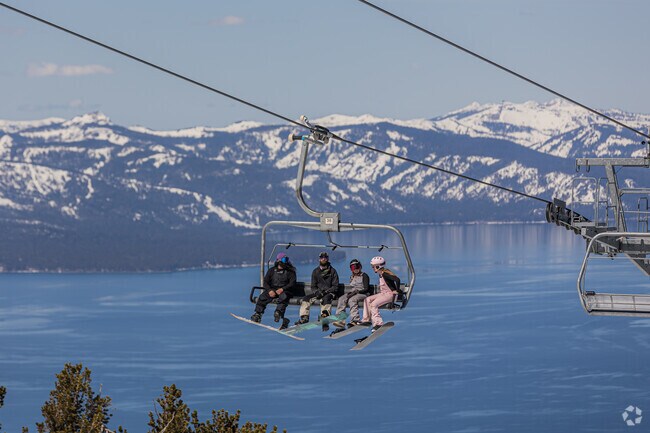 Friends cherish expansive views from Heavenly Ski Resort in South Lake Tahoe.