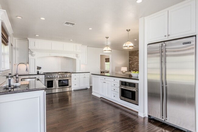 Kitchen features all Jenn-Air professional grade stainless steel appliances