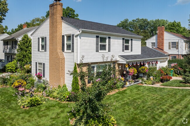 A perfect American Foursquare shines on the corner in Fisk Addition.