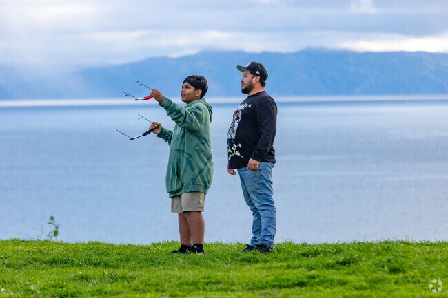 Locals can fly their kites on the bluffs overlooking the Pacific Ocean.