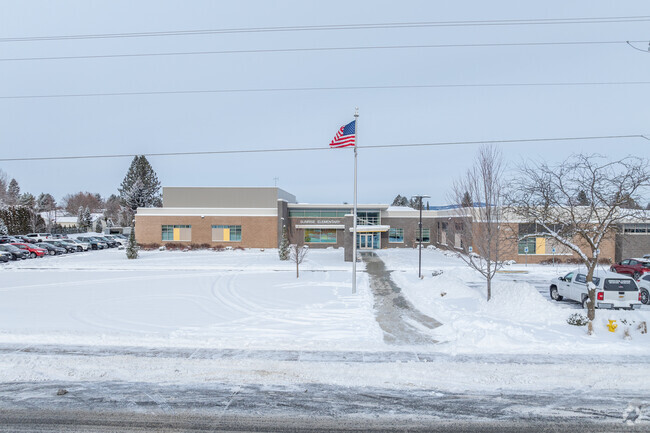 Sunrise Elementary features a large single story building.