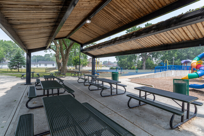 A nice shaded table area at a park nearby F B Mccord Elementary School.