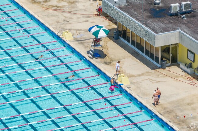 Residents of University Park enjoy swimming at the pool in Tamiami Park.