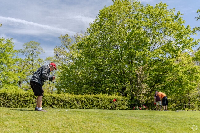 Twin Hills Country Club features scenic views, challenging holes, and well-maintained greens.