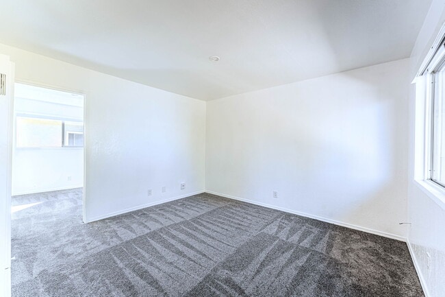 Living room and entry to bedroom