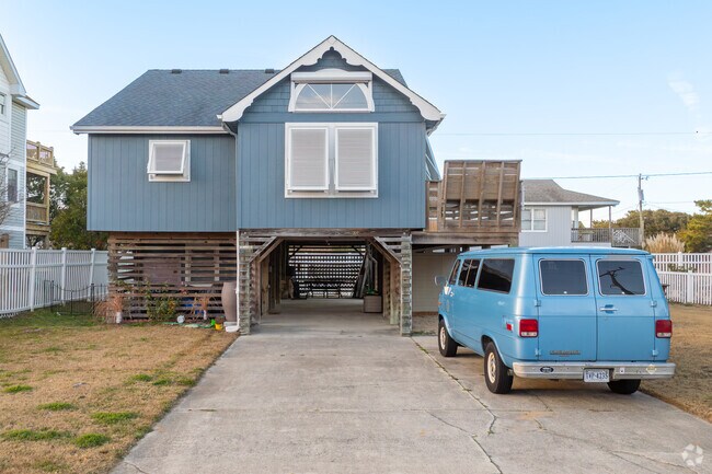 Homes built on stilts in Kill Devil Hills, are designed to protect from storms while offering stunning views of the Outer Banks.