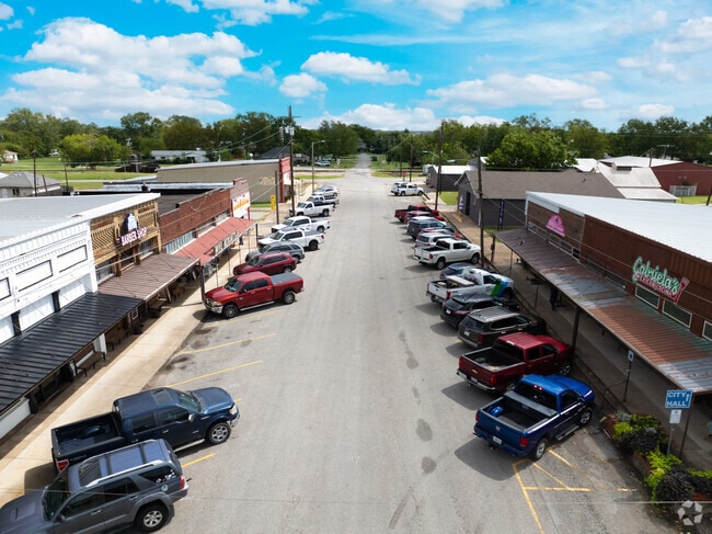 Shops and restaurants line East Haning Street in downtown Howe.