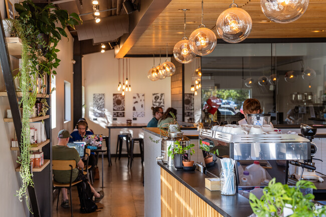 Residents of Sunland Hills, Arvada, Colorado work and relax at Sweet Bloom Coffee Roasters.