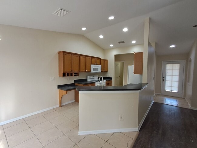 135 Greenbriar Blvd, Lehigh Acres, FL 33972 - photo 2