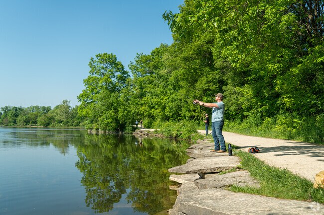 Locals spend time fishing at  Herrick Lake near the Danada community of Naperville, IL.