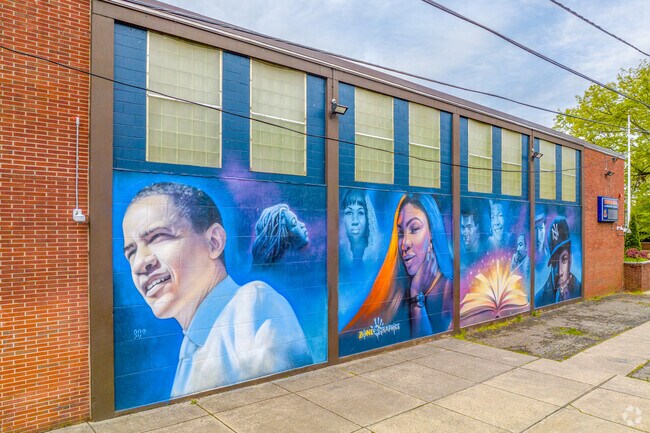 Cadwalader School in the West End neighborhood features a colorful mural.