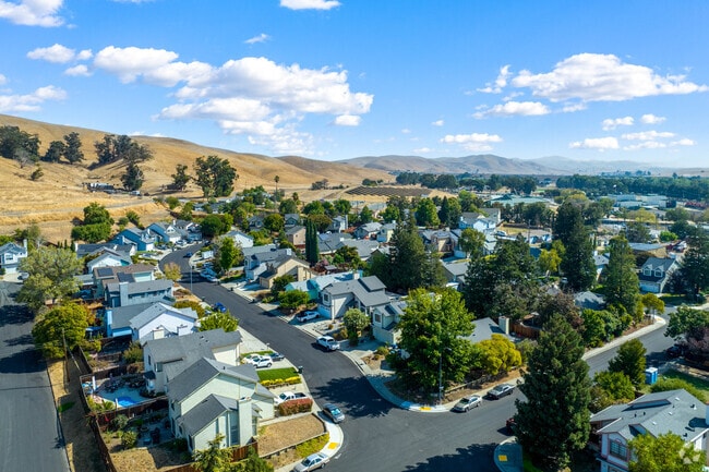 One and two-story homes nestle against rolling hills in the Bay Area suburb of Clyde.
