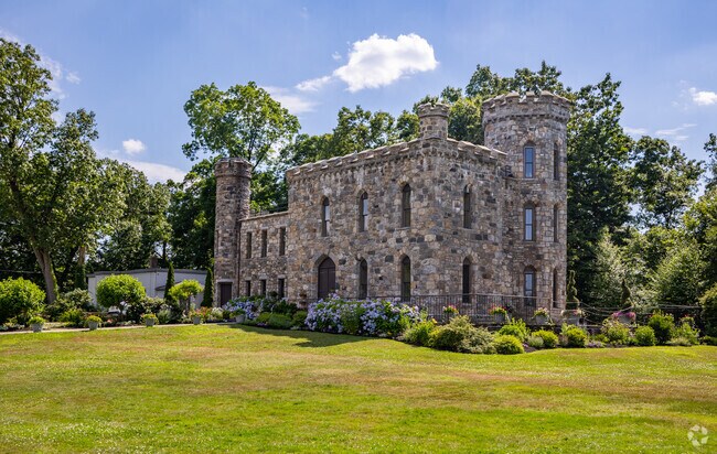 Winnekenni Castle located in East Parish sits in a 700 acre park overlooking Lake Kenoza.