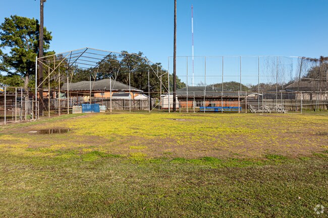 Play a game of baseball at Kings Grant Playground.