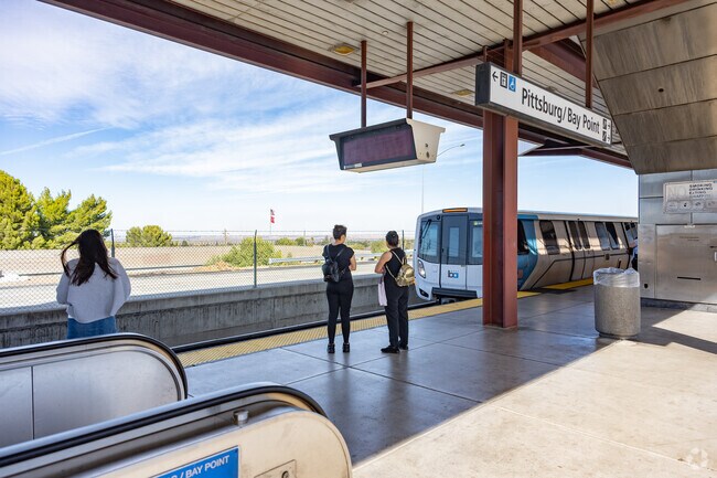 San Marco commuters wait to board the next BART train.