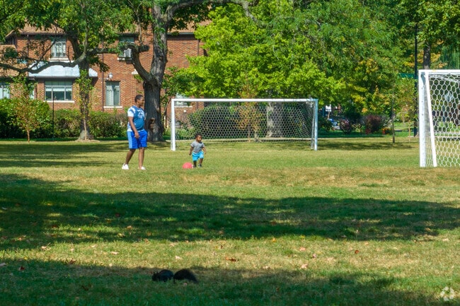 Play on the field at North Rosedale Park.