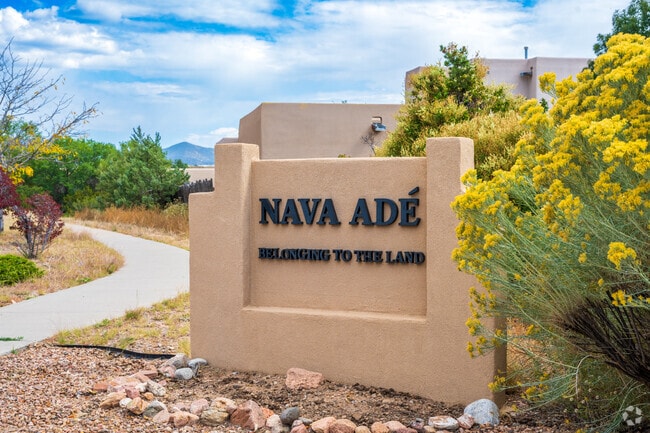 Nava Adé is a Tewa phrase meaning belonging to the land.