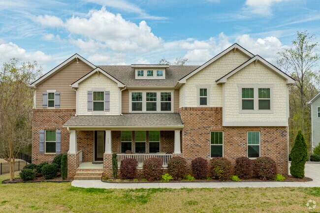 There are many homes with colonial inspired architecture featured on the beautiful neighborhood streets of Legacy at Jordan Lake.
