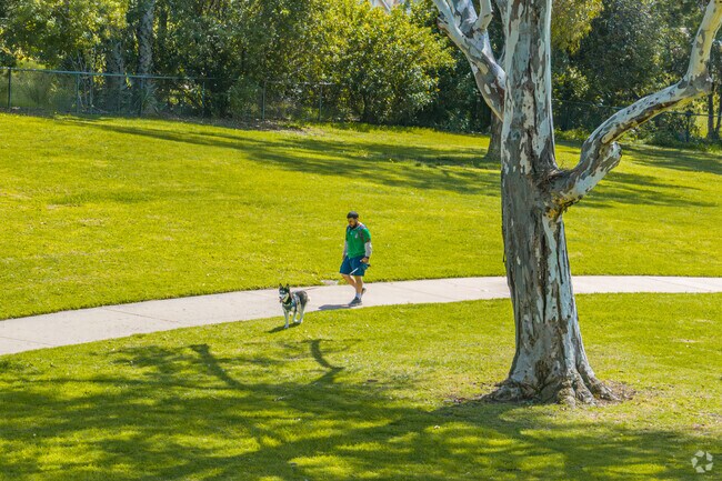 Emerald Hills Community Park features meandering trails great for pet walks.