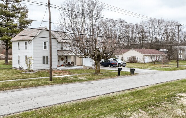 A row of homes with bare winter trees are seen in the Marlboro community.