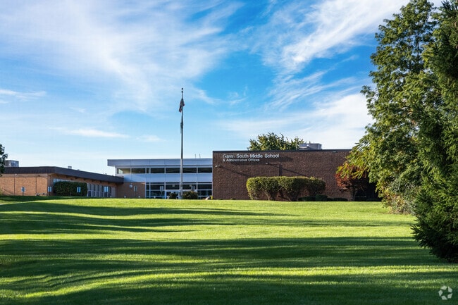 A sprawling green lawn greets visitors to Gavin South Middle School.