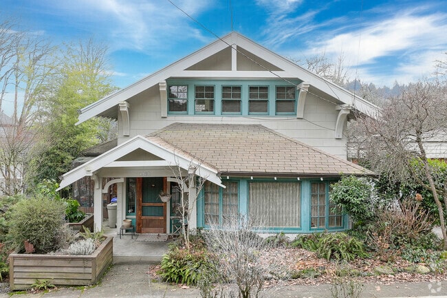 Green Bungalow style home is located in Southwest Hills, Portland, Oregon.