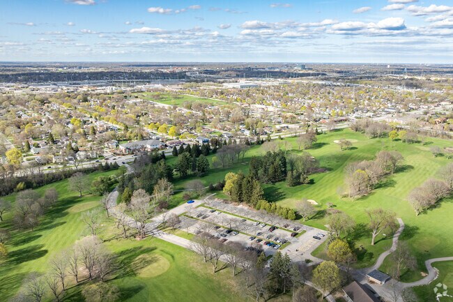 Root River Estates is next to a vast green space with a park and Greenfield Golf Course.