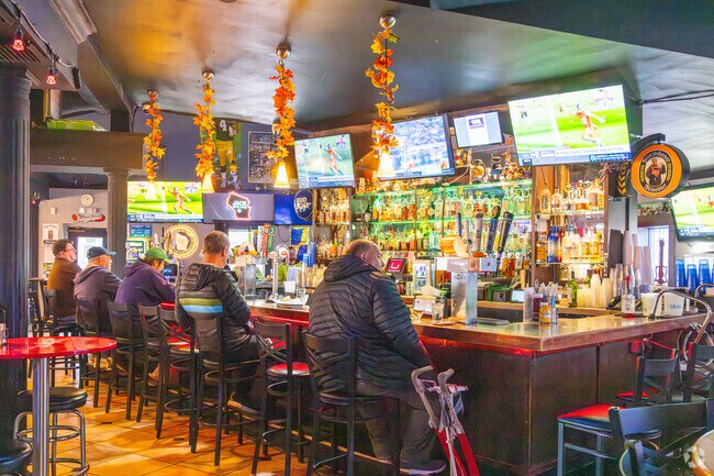 Grab an ice cold beer and pub grub at the Lazy Oaf Tavern near Carpenter-Ridgeway.