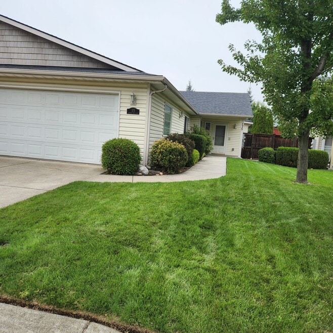 2 car attached garage, lawn care included.