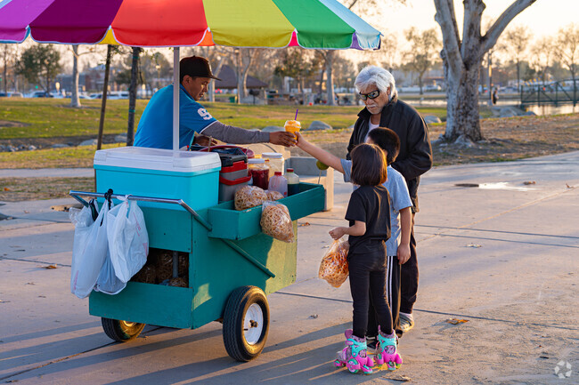 A Bakersfield resident treats his grandchildren to a frozen treat at The Park at River Walk.
