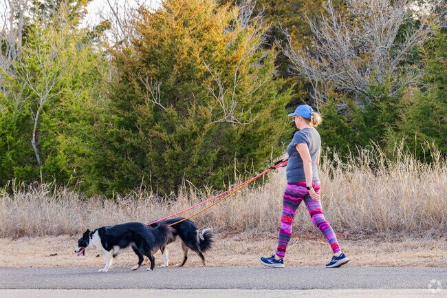 Locals can take their dogs to Bluff Creek Park for a walk.