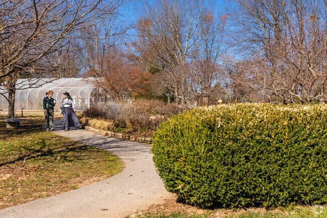 Walkers enjoy a beautiful afternoon at Nathanael Greene Park.