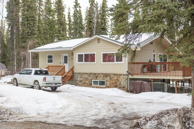 A charming ranch-style home with stonework details anchors this College street.