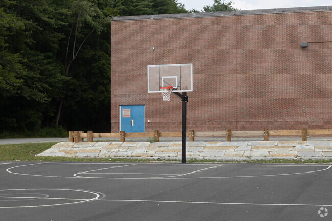 Gerald E. Talbot Community School has a basketball court.