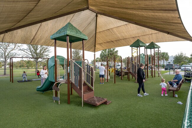The shaded playground at Woodland Trails Park in Crane Landing is fantastic.