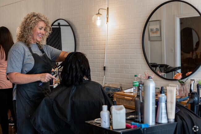 Schedule a hair appointment at Newnan's Hair Society located on the town square.