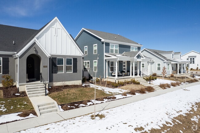 Smaller homes in Herriman sit close together along suburban streets.