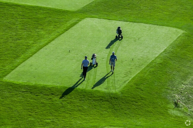 Golfers enjoy scenic fairways at Somerby Golf Club in Byron.