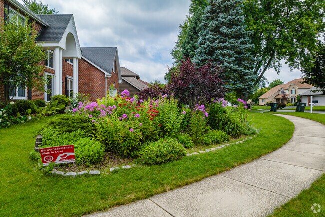 Residents of Greene Valley brighten up the neighborhood with flowers and shrubbery.