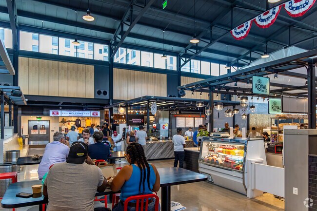 Gather for lunch with friends at one of the many delicious vendors in Lexington Market.
