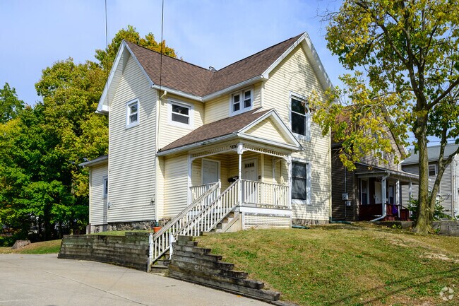 A well-maintained Gablefront and Wing home in The Stadium District.