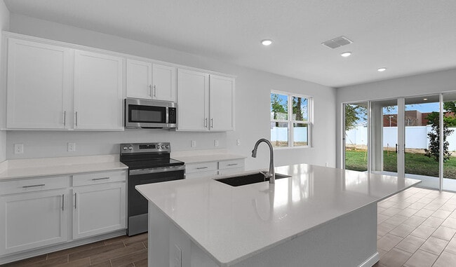 1647 Sugarbelle Cir, Mascotte, FL 34753 - photo 5