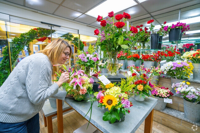 Pick up a bouquet for a loved one from Affairs to Remember Florist in Downtown Melrose.