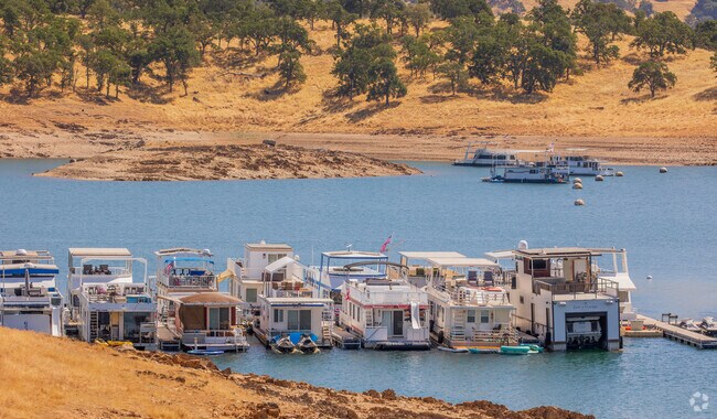 Go house boating at New Melones Lake near Jamestown, Ca.