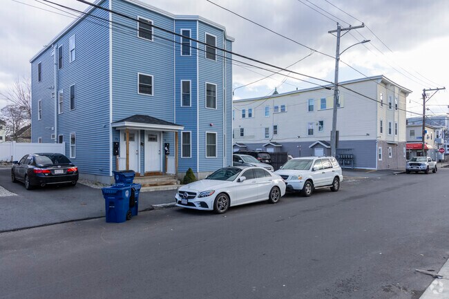 Discover charming multi-family homes in Lawrence, perfect for community living.