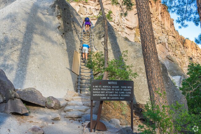 Near Los Alamos, visitors can explore ancient caves and ruins at Bandelier National Monument.