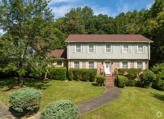 Split-Level homes in Fayetteville have lush green landscaping.